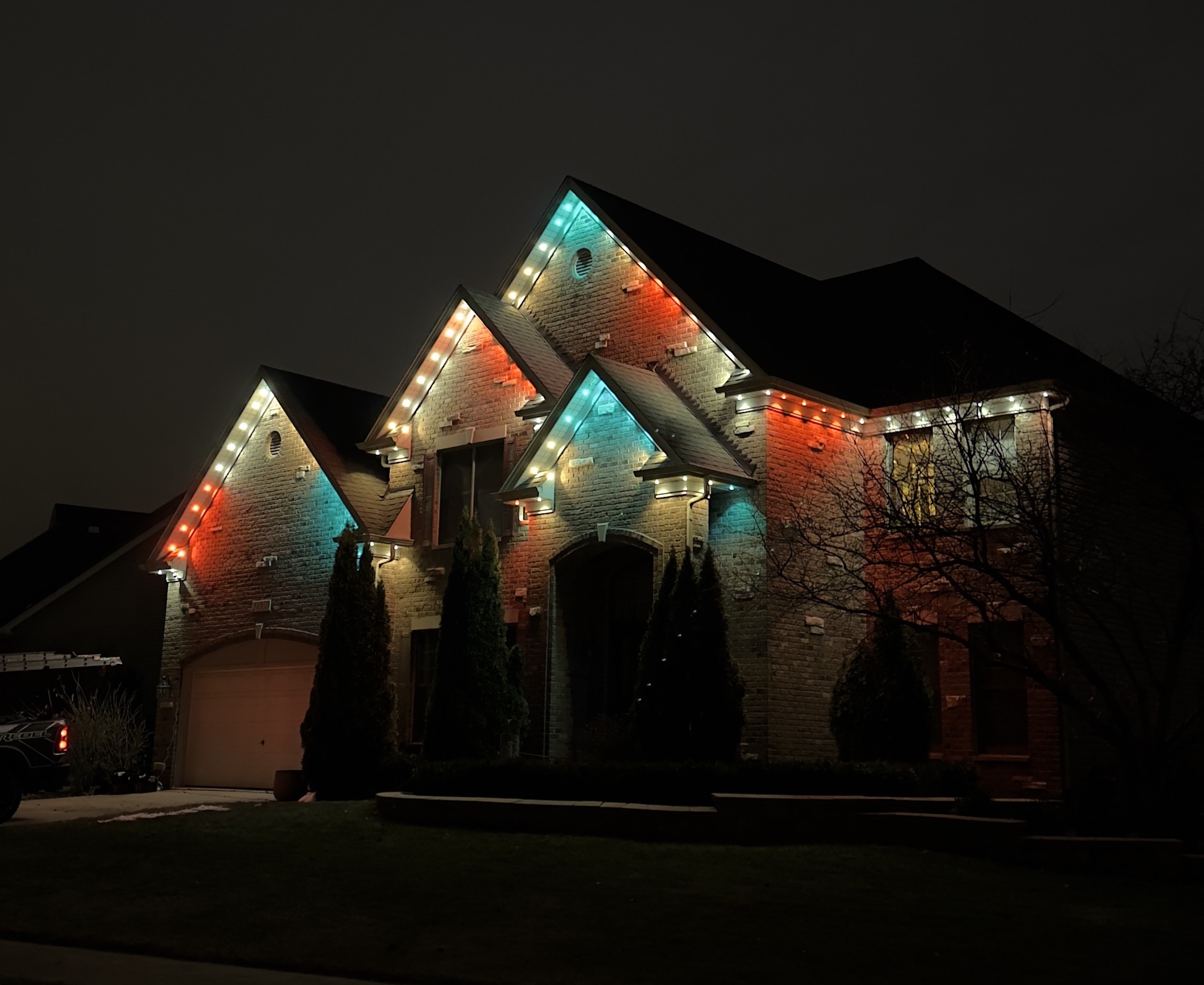 Professional Christmas light installation on residential home roofline — Palatine IL
