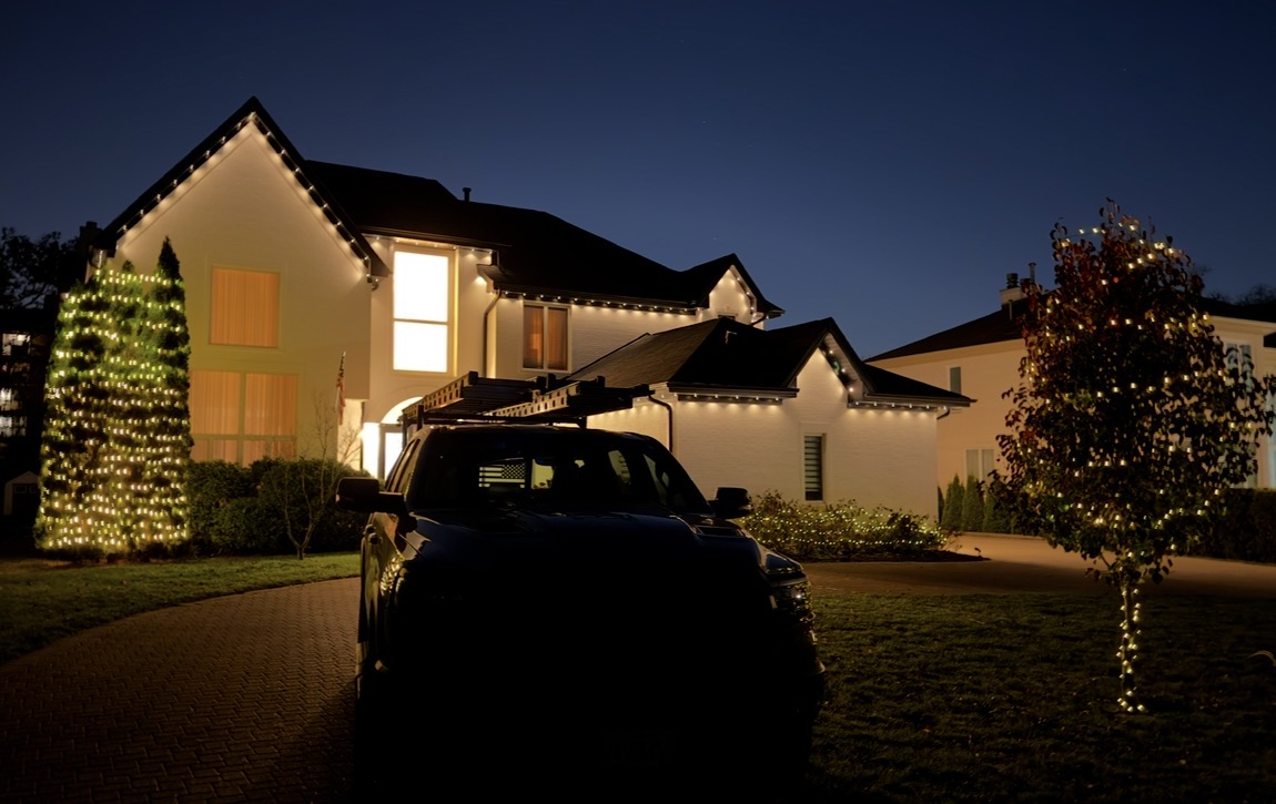 Holiday light installation on house eaves and gutters — Chicagoland suburbs